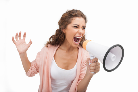 Woman Yelling Into Megaphone