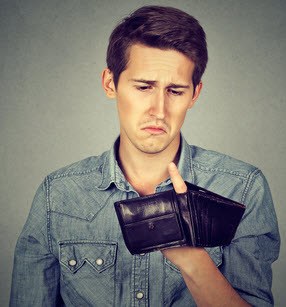 Man Stressed Over Empty Wallet