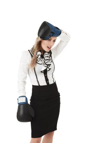 business woman with boxing gloves