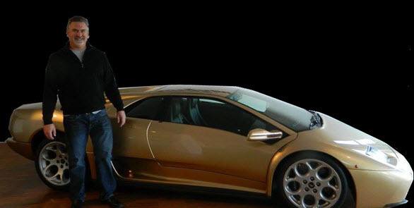 Dave Landry standing in front of a Lambo